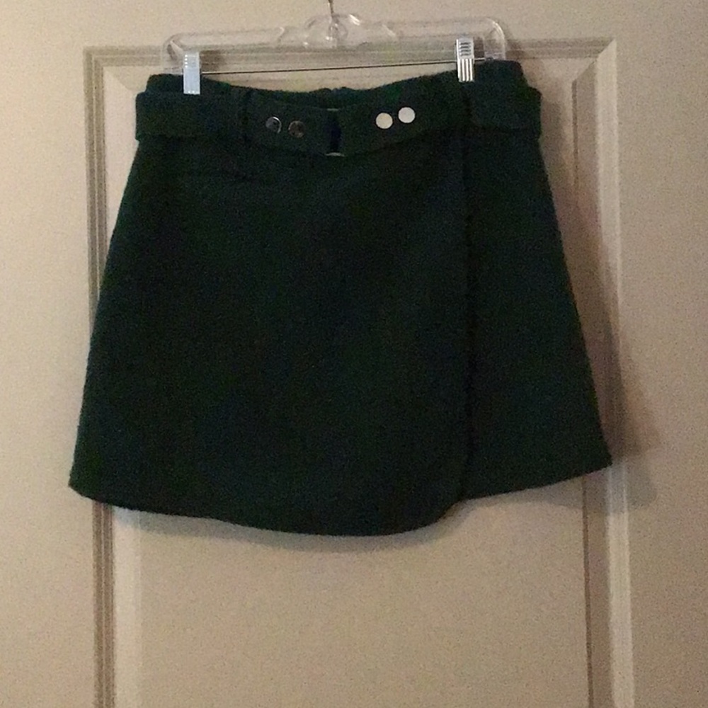 Thick, emerald green miniskirt